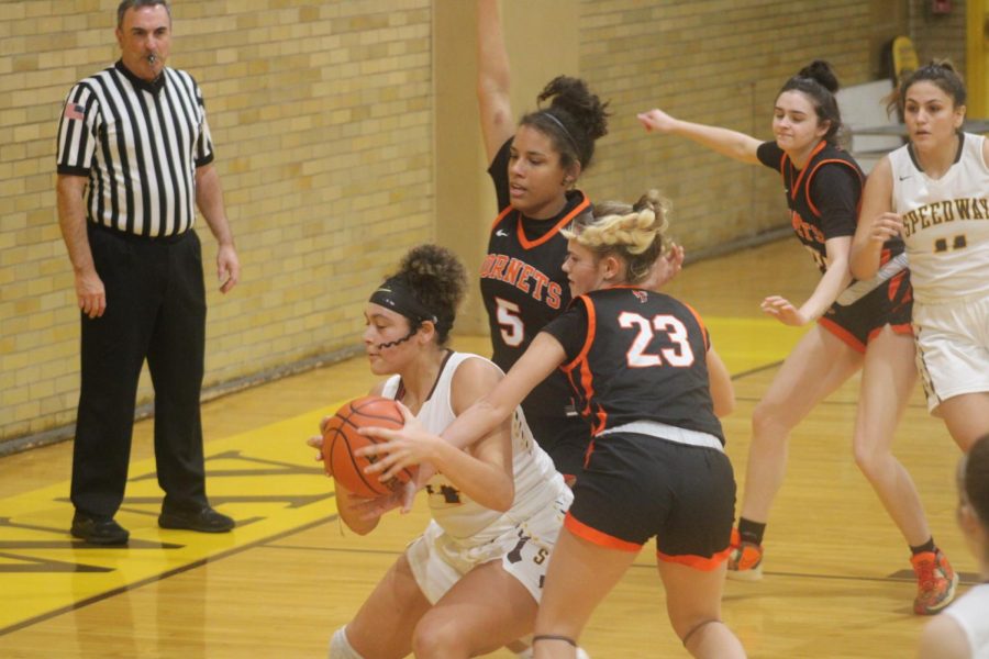 Genesis Austin fights for possession in action earlier this month against Beech Grove.
The Lady Sparkplugs start sectional play next Tuesday night when they host the Hornets.