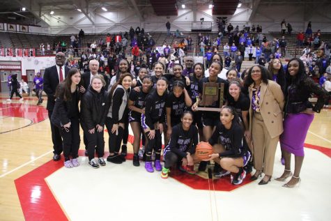The Ben Davis girls pose with heir sectional championship trophy.