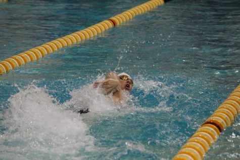 Making that deep breath worth it. Senior Kaden Jackson-Dietzer and his teammates on
the Speedway boys swimming team start sectional competition Thursday at
Brownsburg. 