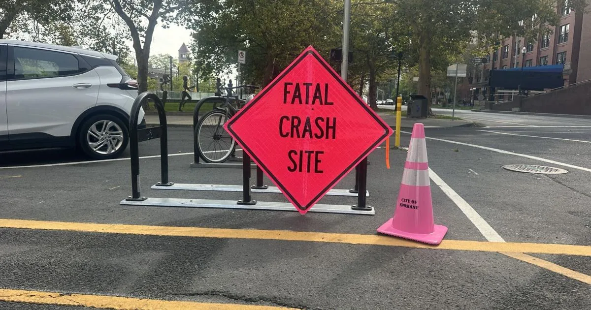 Traffic cones and signs along South Ash Street during a temporary lane closure in Spokane