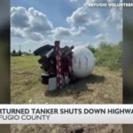 Emergency crews respond to a butane tanker rollover that closed U.S. 77 near State Highway 239