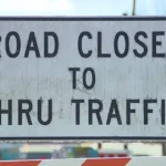 Traffic moves along Interstate 285 near a road work zone in southwest Fulton County