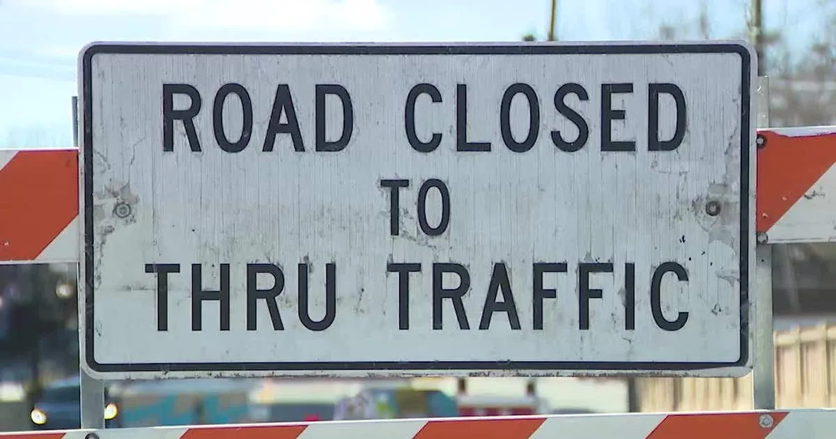 Traffic moves along Interstate 285 near a road work zone in southwest Fulton County